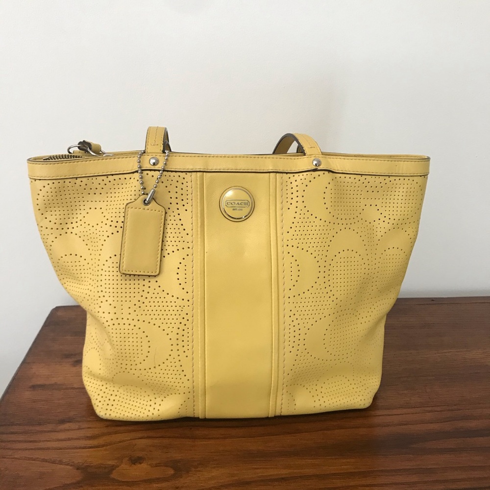 COACH yellow signature perforated leather tote bag
